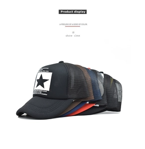 Detail showing stacked vintage trucker hats with mesh back and embroidered star patches