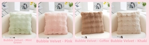 Detail of bubble fleece square pillows in four Morandi colors on a minimal sofa