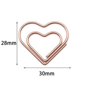 Rose gold heart-shaped metal paperclip measuring 30mm by 28mm on white background