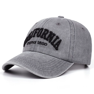 Detail of vintage washed gray cotton baseball cap with black California embroidery