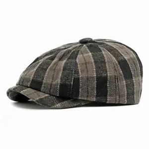 Classic grey plaid newsboy cap with vintage octagonal design and button top detail