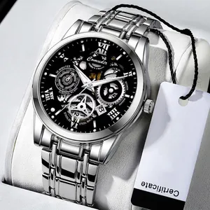 Sliver stainless steel men's skeleton watch with a black mechanical dial on a white pillow