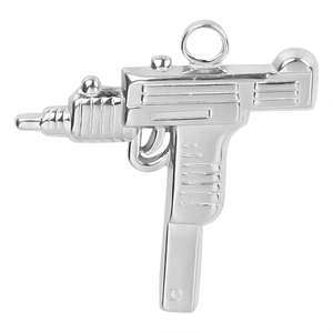Macro shot of silver Uzi submachine gun pendant in polished stainless steel