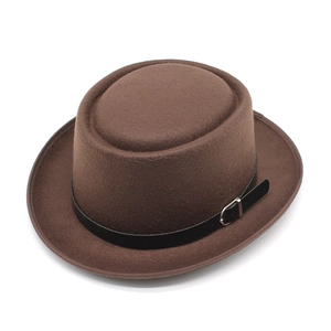 Classic brown felt bowler hat with black decorative band and metallic buckle detail