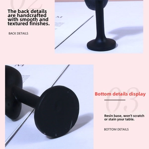 Detail view of handmade black resin earring display stand with back craft and base details