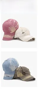 Detail view of distressed cotton baseball caps with frayed edges and vintage textures
