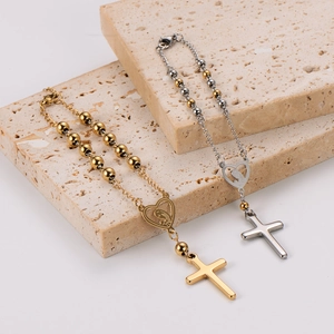 Religious catholic rosary style heart and cross bracelets in gold and silver polished finishes