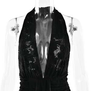 Detailed view of black lace halter neck dress with plunging V-neckline on a mannequin