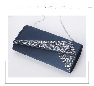 Detail of navy blue envelope clutch bag with silver rhinestone triangle decor
