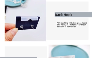 Detail of integrated white PVC earring card hook for jewelry display and hanging