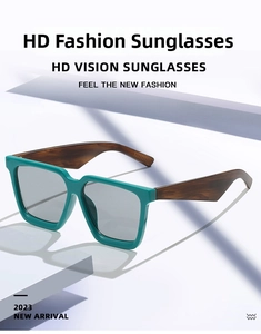 Detail of square turquoise sunglasses frame with vintage tortoiseshell texture temples