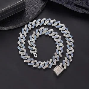 Macro detail of 15mm hip hop Cuban link chain with blue and white cubic zirconia stones
