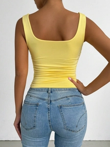 Slim fit yellow ribbed knit tank top for women with a back view showing square neckline