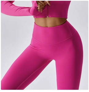 Detail of rose pink high-waist yoga set with long sleeve cropped zipper top and leggings