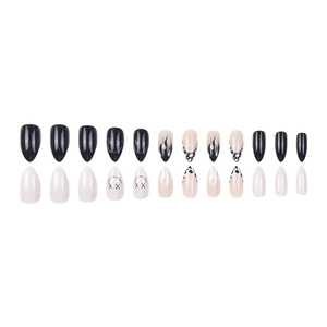 Almond-shaped Halloween press-on nails with black flame, cow print, and smiley face designs