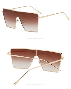 Detailed front and back view of oversized square sunglasses with gold metal frame