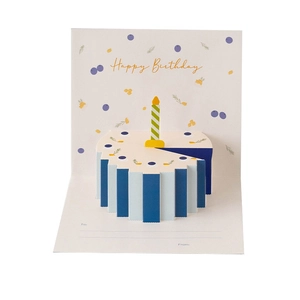 3D pop-up birthday card featuring a blue striped cake with a candle on white background