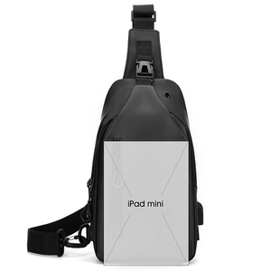 Waterproof black crossbody chest bag for men showing storage capacity for iPad mini