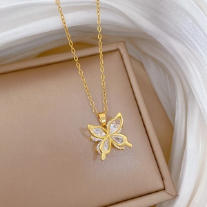 Elegant gold titanium steel necklace featuring a hollowed-out zircon butterfly pendant