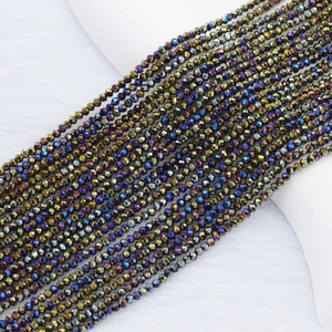 Detailed view of 2mm iridescent faceted glass spacer beads for DIY jewelry making
