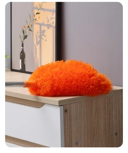 Detail of fluffy orange microfiber ceiling fan duster head with stainless steel connector