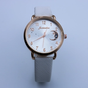 Fashion women's quartz watch with rose gold case, moon star dial and white leather strap