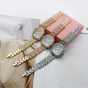 Chic square rhinestone watches in gold, rose gold and silver on a fashion magazine background