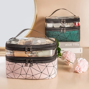 Double-layer PU cosmetic bag with geometric quilted pattern and portable hand strap