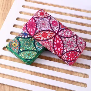 Ethnic style long zip-around wallets with mandala patterns in red and green colors
