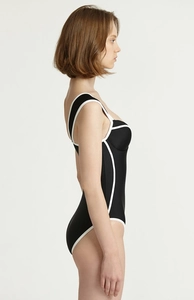 Detail view of one-piece swimsuit with high-density stretch fabric and white piping
