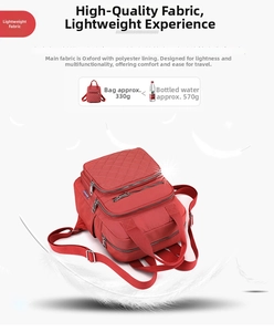 Detail of red quilted oxford backpack showing light weight of 330g with feather decor