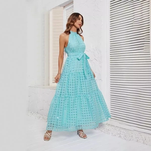 Light blue halter maxi dress with ruffle tiers and waist bow tie for summer vacation