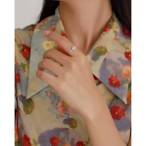 Elegant S925 silver ring with rectangular zircon stone shown on a model hand