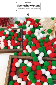 Macro detail of red, white, and green Christmas pom poms for DIY festive holiday decoration
