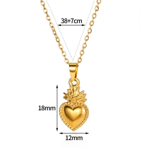 Detailed view of 18k gold heart pendant necklace with measurements and polished finish