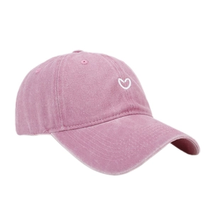 Pink washed cotton baseball cap with white heart embroidery and retro casual style