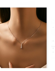 Close-up of S925 sterling silver Y-shaped tassel necklace with sparkling moissanite stones