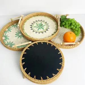 Set of 4 woven rattan trays with wooden handles and floral patterned shell base inserts