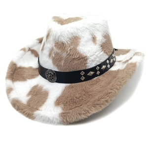 Plush cow print western cowboy hat with brown patterns and studded leather band