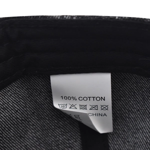 Detailed view of 100% cotton washing label and inner stitching on vintage baseball cap