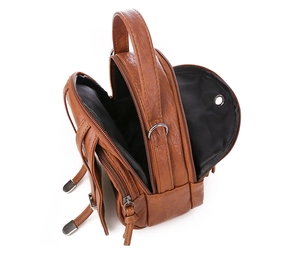 Detail view of brown vintage PU leather bag showing three multi-compartment zipper sections