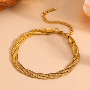 Detail view of multi-strand gold snake chain bracelet with adjustable lobster clasp closure