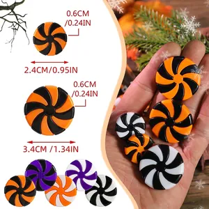 Halloween spiral candy ornaments in black, purple and orange with size measurements