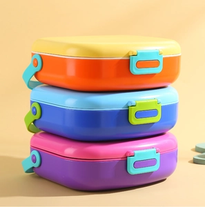 Vertical stack of 5-compartment kids bento boxes with colorful side latches and handles