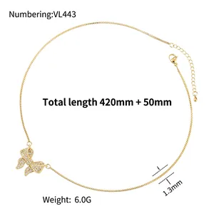 Elegant gold bow pendant necklace with sparkling cubic zirconia on a fine box chain