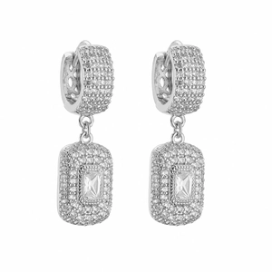 Macro view of silver square drop earrings with emerald-cut crystals and pave setting