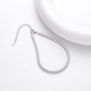 Detailed macro view of S925 sterling silver tennis bracelet with cubic zirconia stones