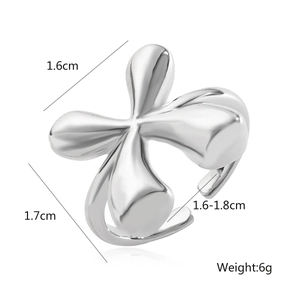 Detail shot of silver abstract flower ring showing dimensions 1.6cm x 1.7cm and weight 6g