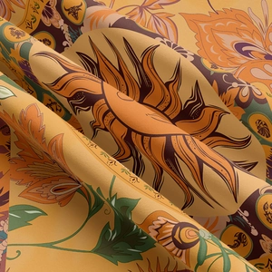 Detail showing the soft fabric texture and Bohemian sun pattern on this wall tapestry