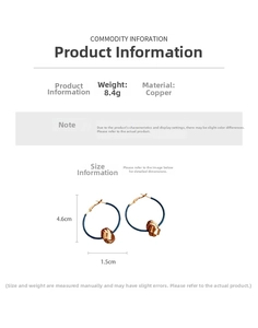 Detailed view of 18K gold plated twisted knot hoop earrings with size specifications